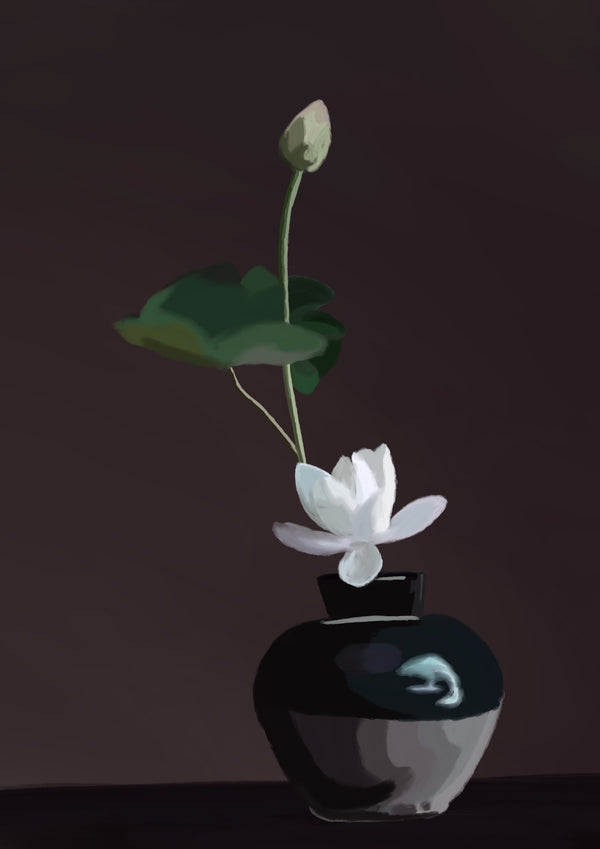 Black vase with a white flower and green leaves on a dark background